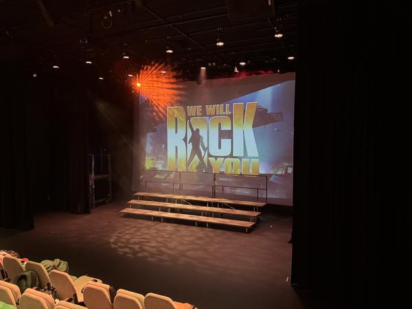 We Will Rock You – What a Triumph! Banner Photo
